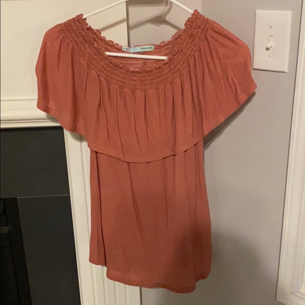 Off the shoulder shirt.